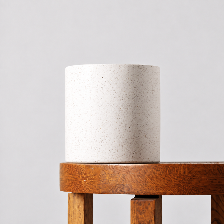 Jardin white terrazzo pot on a timber table against a soft grey background.